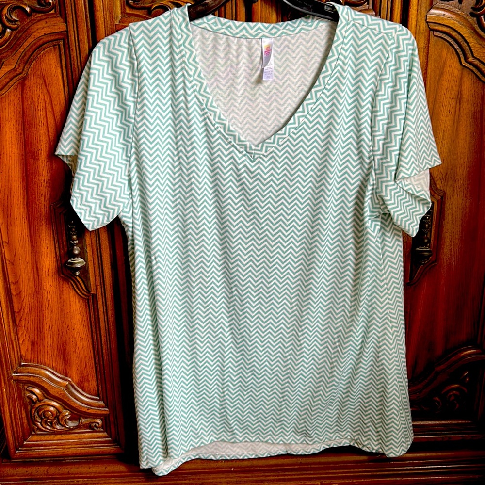 Light green chevron style blouse.